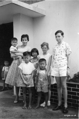 Arrival in Singapore Dec 1958 staying at the Waverley Guest House, Pasir Panjang â€“ I am in the centre but who are the other two English children?
Keywords: Susan Perry;Pasir Panjang;Waverley Guest House;1958