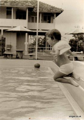 Kranji pool
Kranji pool.  The building behind was popularly known as "Rose Cottage!" Young female skeletons were discovered under it dating from the Japanese occupation. Our bungalow was down the hill behind this building.
Keywords: Lucy Childs;Kranji pool;Rose Cottage;Japanese occupation