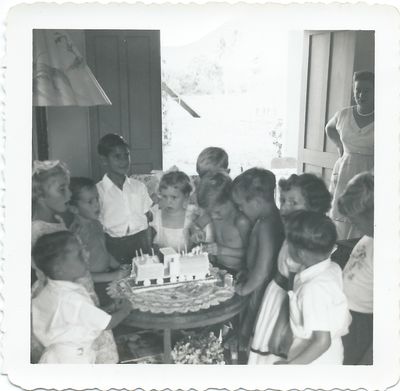 Party
Me lighting the cake, mother in the background.
Keywords: Ian Mackins