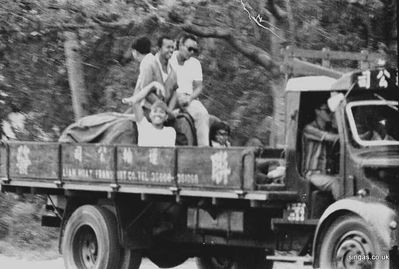 Riding Shotgun
taken in and around Holland Village. Health and Safety certainly didn't exist in those days!"
Keywords: Maurice Hann;Holland Village;lorrys;trucks