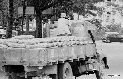 Riding Shotgun
taken in and around Holland Village. Health and Safety certainly didn't exist in those days!"
Keywords: Maurice Hann;Holland Village;lorrys;trucks