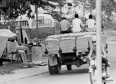 Riding Shotgun
taken in and around Holland Village. Health and Safety certainly didn't exist in those days!"
Keywords: Maurice Hann;Holland Village;lorrys;trucks