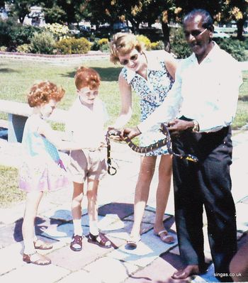 Snake Handler
Me as a boy, Mum & Karyn with snake handler on Singapore habour 1967
Keywords: 1967;Kevin Smith;Snake Handler