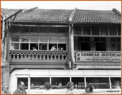 Street scene Singapore circ 1965
Another street scene. My mother and father bottom left
Keywords: Street Scene;1965