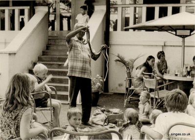 Watching the gully gully man
Watching the gully gully man, Singapore.
Keywords: Lucy Childs;gully gully man