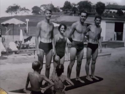 dockyard Swimming Pool 1956
me, with my two brothers and my uncle. 
