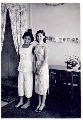 me with our lovely Amah Seng Ng
christmas 1958 - me with our lovely Amah, Seng Ng. at 229e St. johnâ€™s Rd HM Naval Base. 
