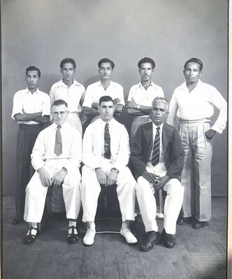 My father seated centre front with colleagues 1949
My father was posted to Naval Base Singapore 1947-1949.   
