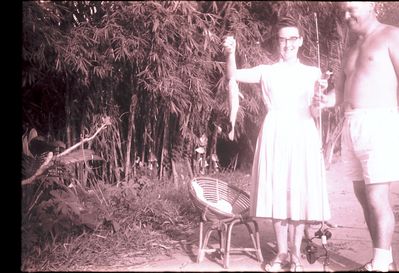 Mum's first catch, at the Fishing ponds. Think it was over at Seletar, or the one along the Pasir Ris road.
