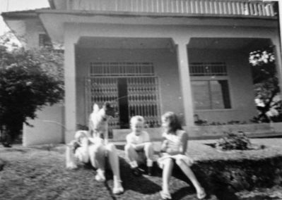 My sister,her friend and brother with Tina our dog in the garden at Island View - 1970
