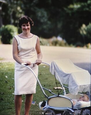 My mum Mae Moffett taking my brother Chris for a pram ride - 1966
Keywords: Mae Moffett; Christopher Moffett; 1966