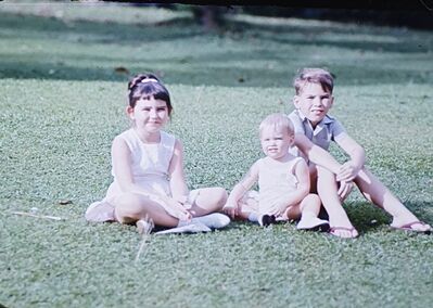 Sitting in a park in Singapore. L-R: Gill Moffett, Chris Moffett, Dave Moffett
Keywords: Gillian Moffett; Christopher Moffett; David Moffett; 1966